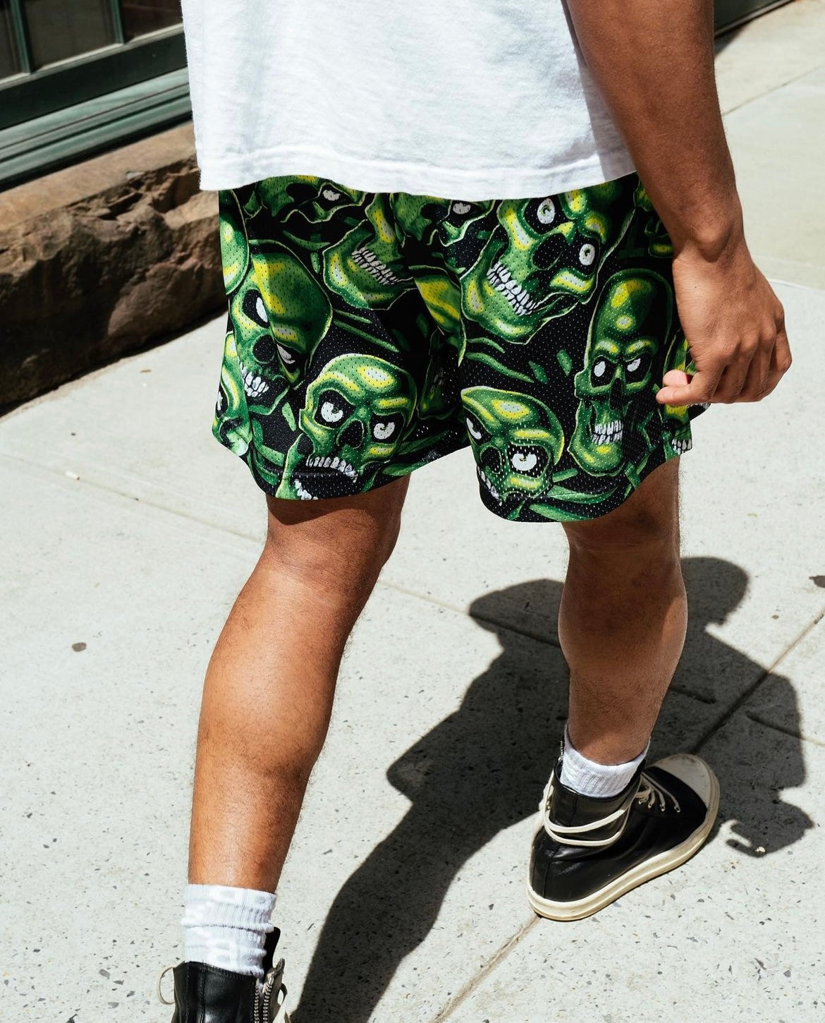 GREEN SKULL MESH SHORTS